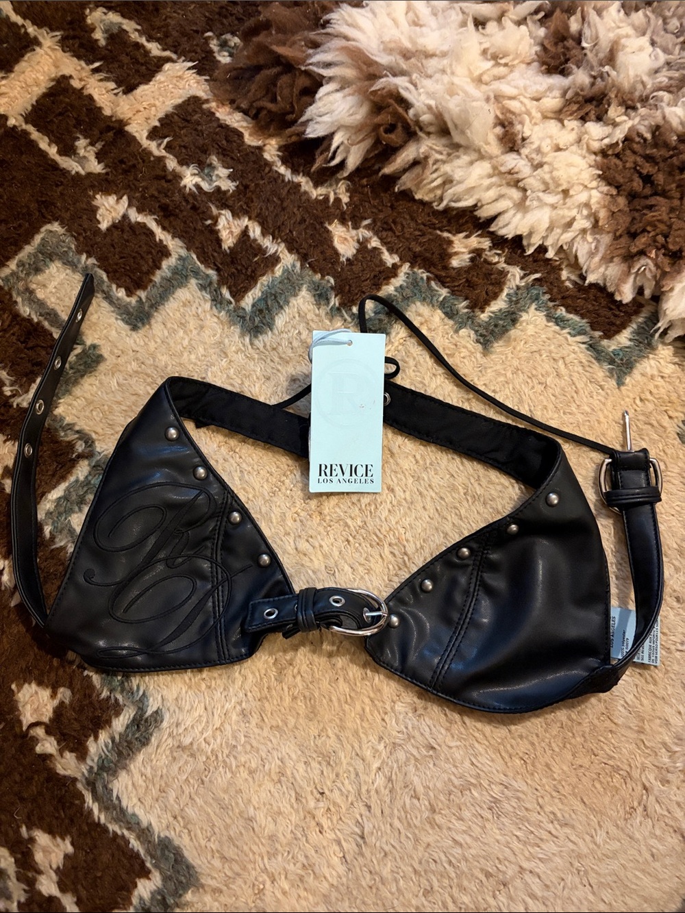 REVICE Black Faux Leather Studded Halter Bra Top with Ring Detail
